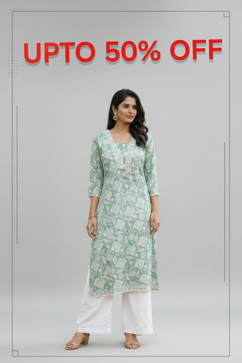 Woman wearing a light green patterned kurta with white pants in an outdoor setting.