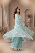 Aqua embroidered kurti twirl pose