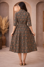 Back view of brown paisley patterned dress