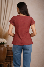 Back view of red chevron patterned top