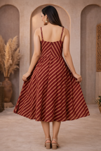 Back view of red diagonal striped dress