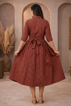 Back view of red medallion patterned dress