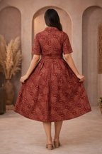 Back view of red patterned dress
