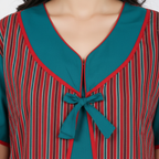 Close-up neckline bow detail