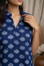 Close-up of medallion print and collar detail