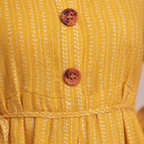 Close-up textured fabric and button detail