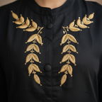 Golden embroidery detail close-up