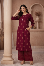 Maroon embroidered kurti leaning pose