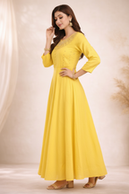 Side angle highlighting embroidered neckline