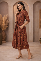 Side view of brown patterned dress
