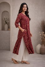 Side view of maroon printed kurti with palazzo