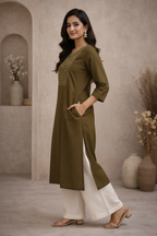 Side view of olive green kurti with embroidered yoke