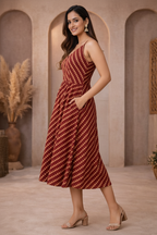 Side view of red diagonal striped dress