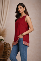 Side view of red sleeveless tunic top