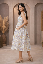 Side view of white floral printed dress