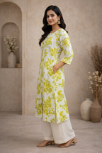 Side view of white kurti with lime green floral print