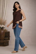 Walking pose in brown sleeveless tunic top