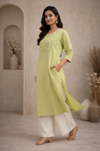 Walking pose in lime green kurti with palazzo