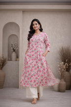 Walking pose in pink floral printed kurti with palazzo
