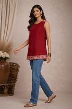 Walking pose in red sleeveless tunic top
