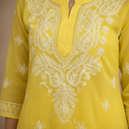 White embroidery detail close-up