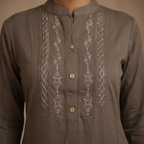 White embroidery detail close-up