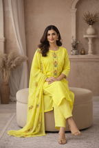 Yellow embroidered kurti seated pose